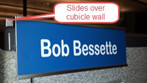 Nameplate sliding onto cubicle wall.