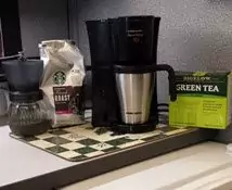 https://workspacebliss.com/tips-create-a-coffee-and-tea-corner-in-your-office-cubicle/