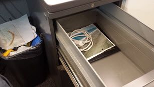 Cubicle drawer after decluttering.
