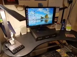 View of Mind Reader monitor riser computer stand with drawer in my home office