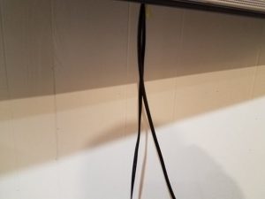 Cables hanging from monitor in my home office
