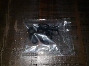 Package of ear tips and ear hooks