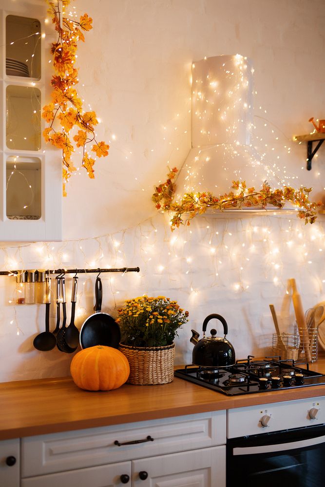 twinkling string lights with fall decor