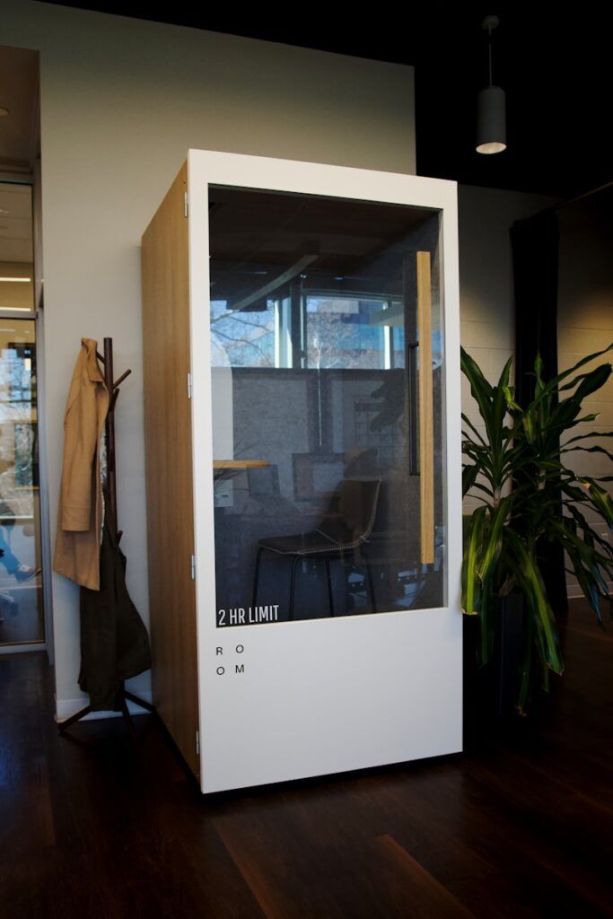 a room with a chair and a table inside of it