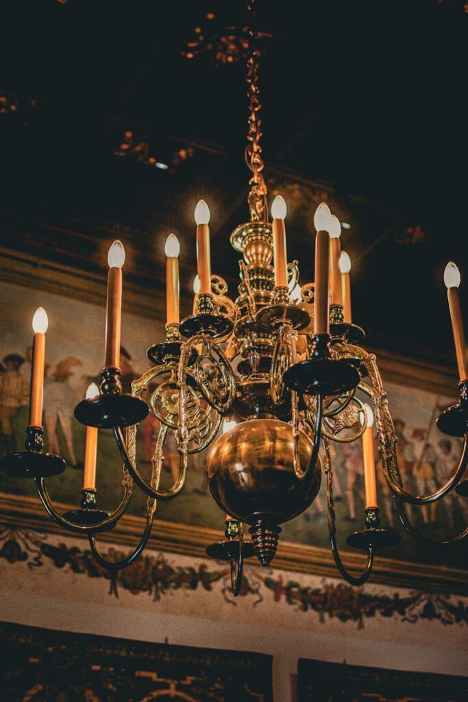 A chandelier hanging from a ceiling in a room