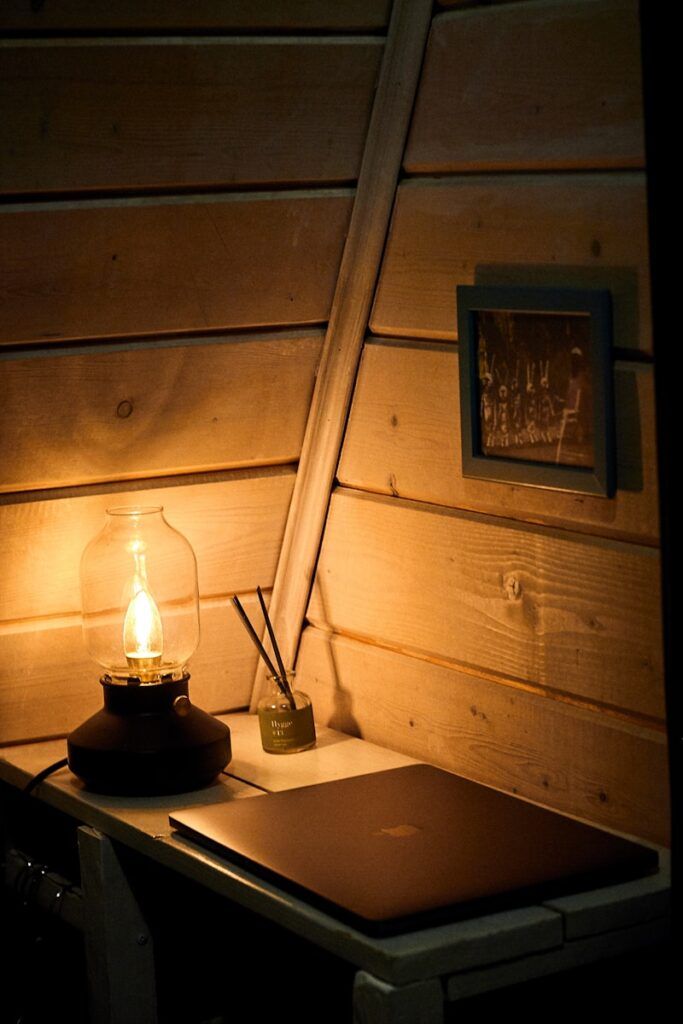 a rustic lantern on an office table