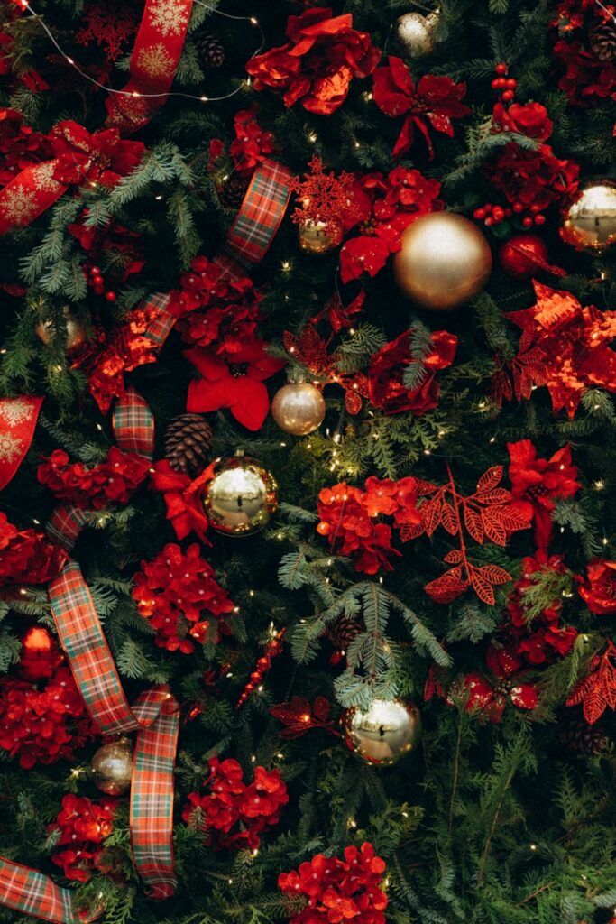 a christmas tree with red and green plaid ornaments