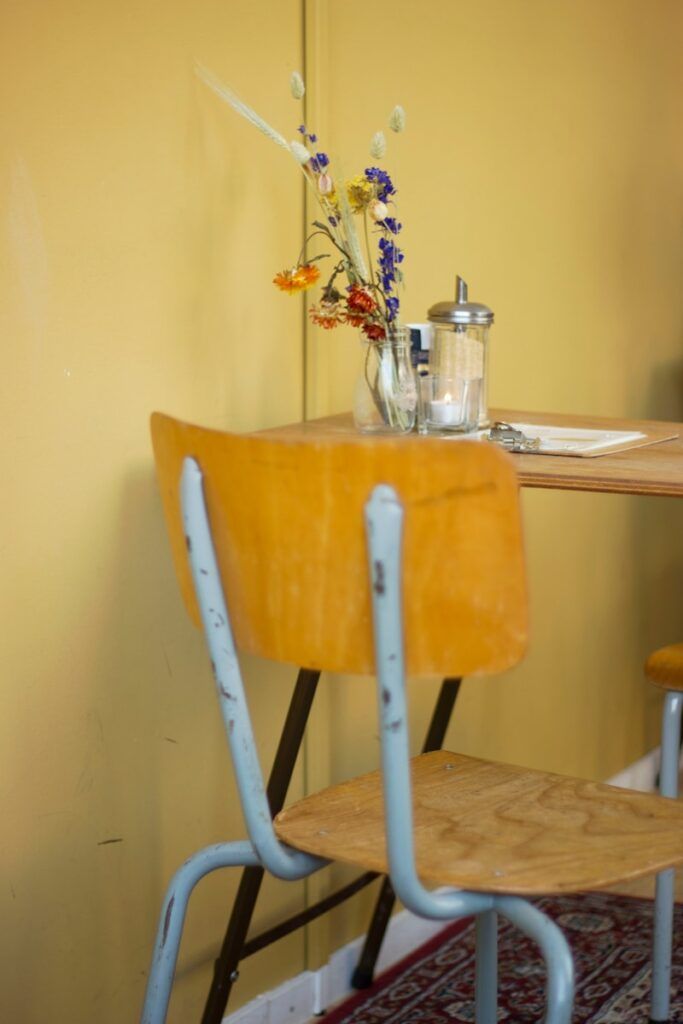 brown chair near table