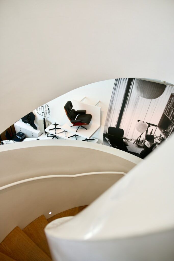 view of spiral stairs inside office