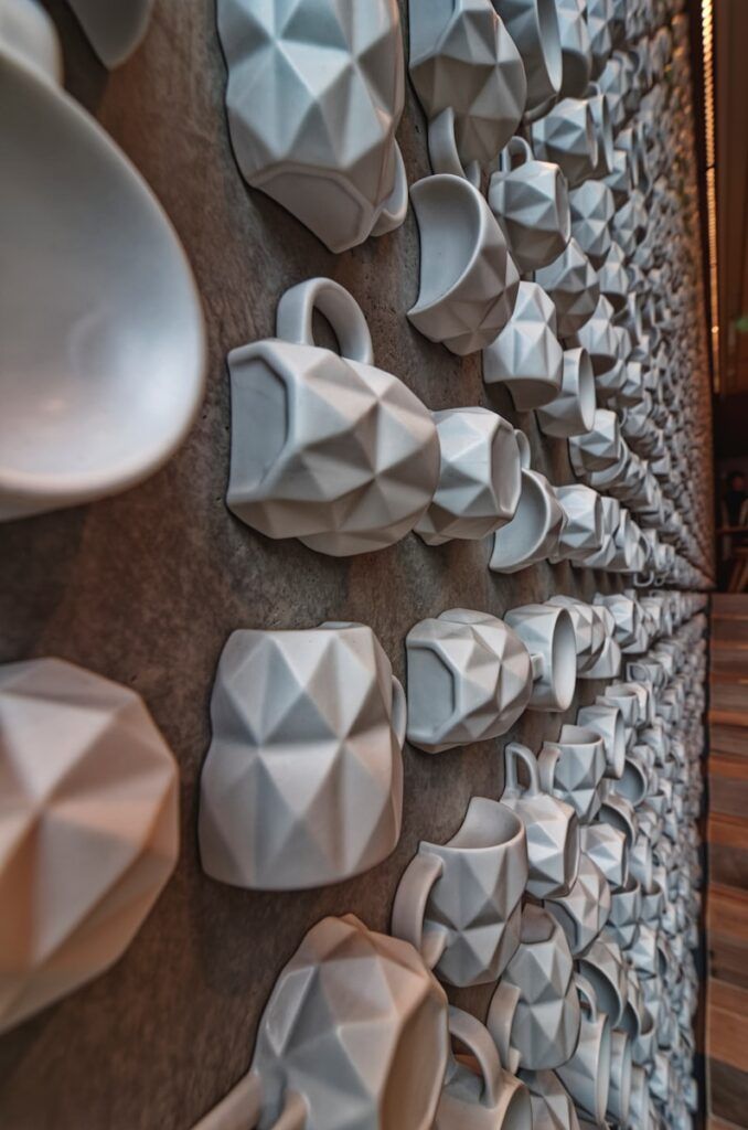 a wall with a bunch of cups on it