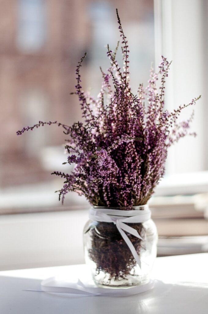 lavender desk plant with clear glass vase centerpiece
