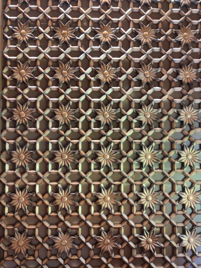 a wall with a design
