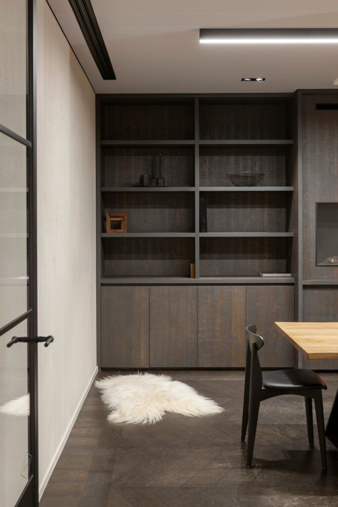 white fur textile on black chair