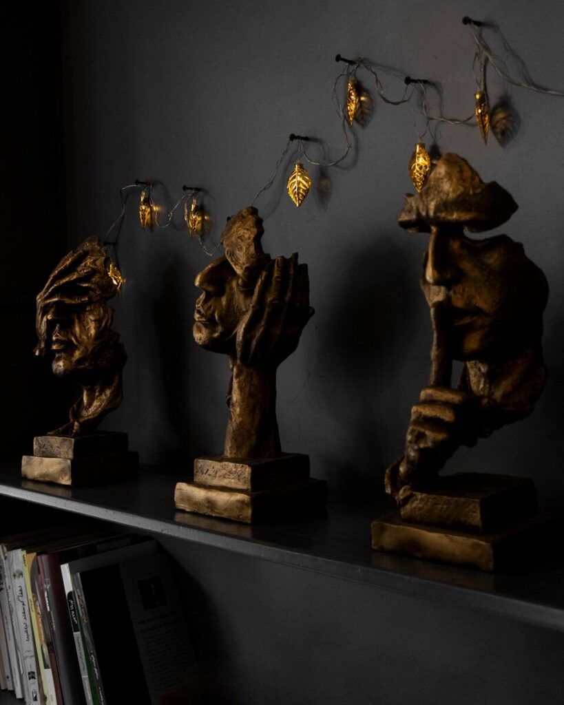 art deco sculptures on shelf
