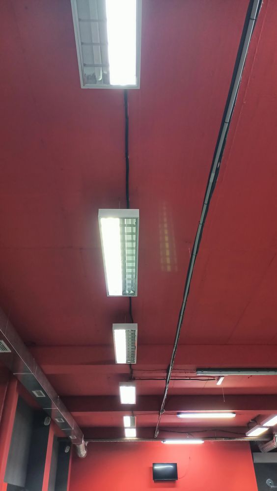 evenly-spaced office lighting