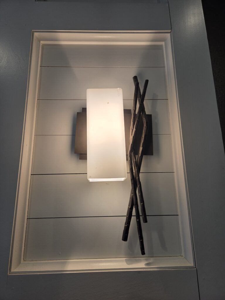 Modern Wall Sconce With Decorative Metal Detail