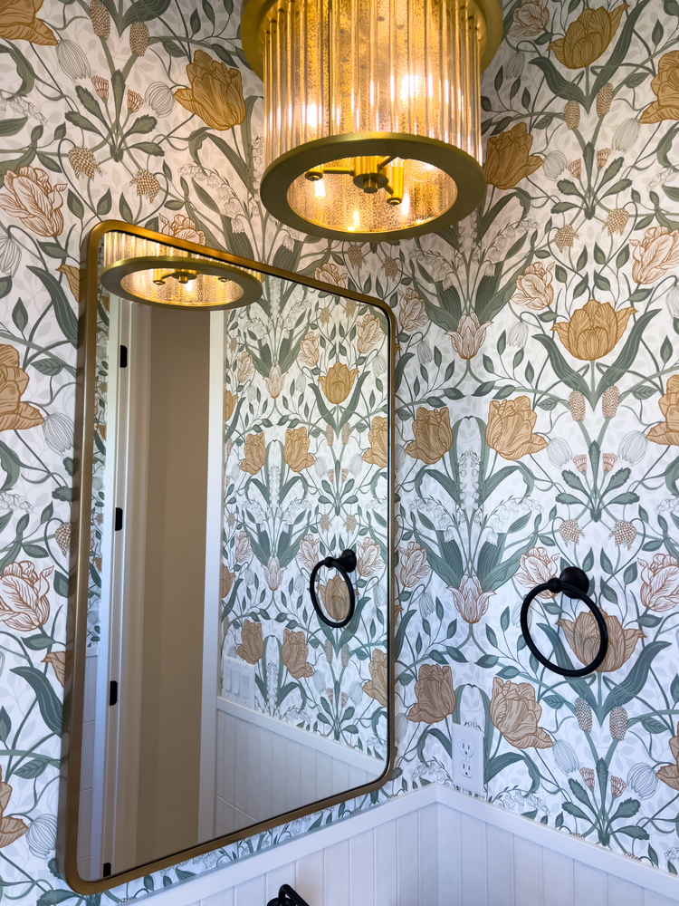 botanical wallpaper as a bathroom accent wall