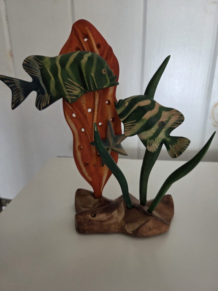 wooden fish sculptures