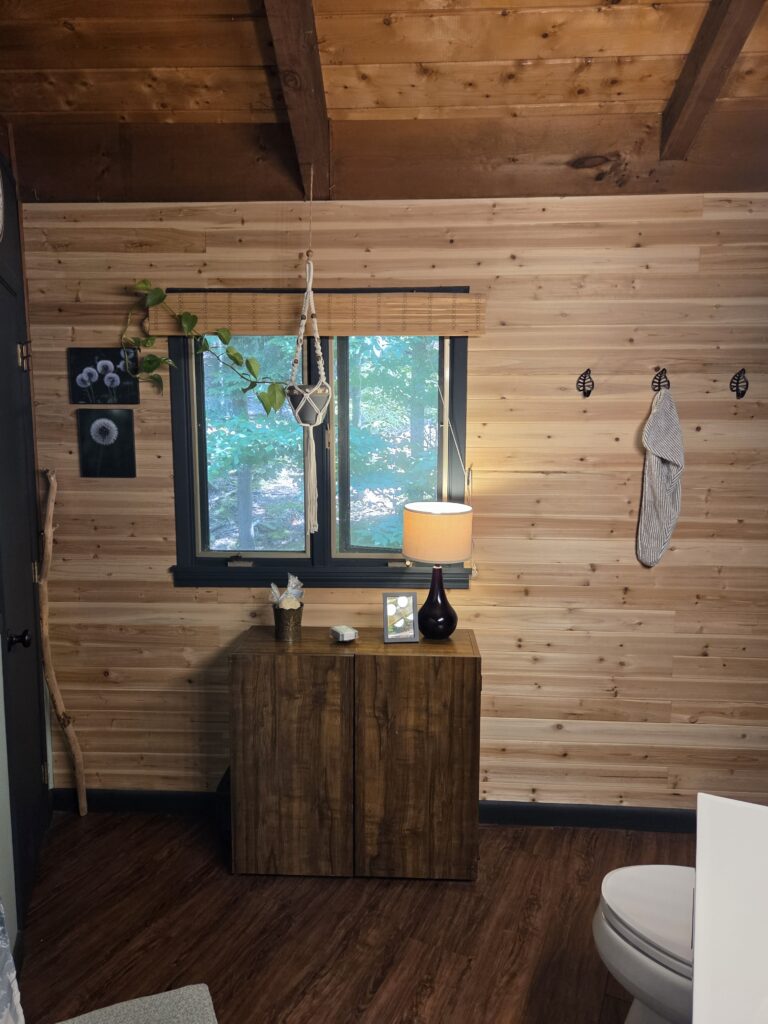 pine wood paneled bathroom accent wall