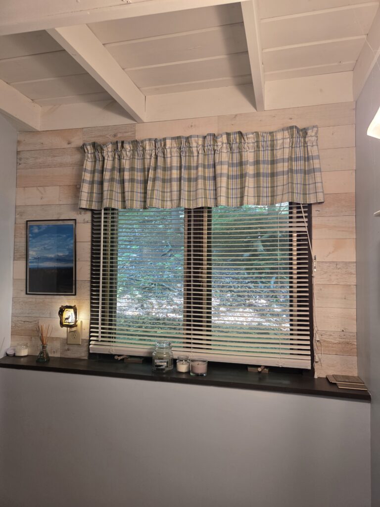 white-washed wood planking on a bathroom wall