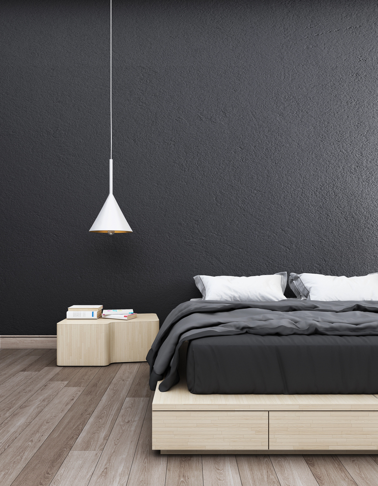 Black Accent Wall Bedroom with Light Wood Accents