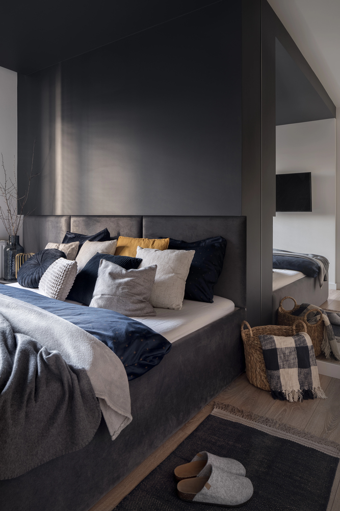 Matte Black Statement Wall in a Cozy Modern Bedroom