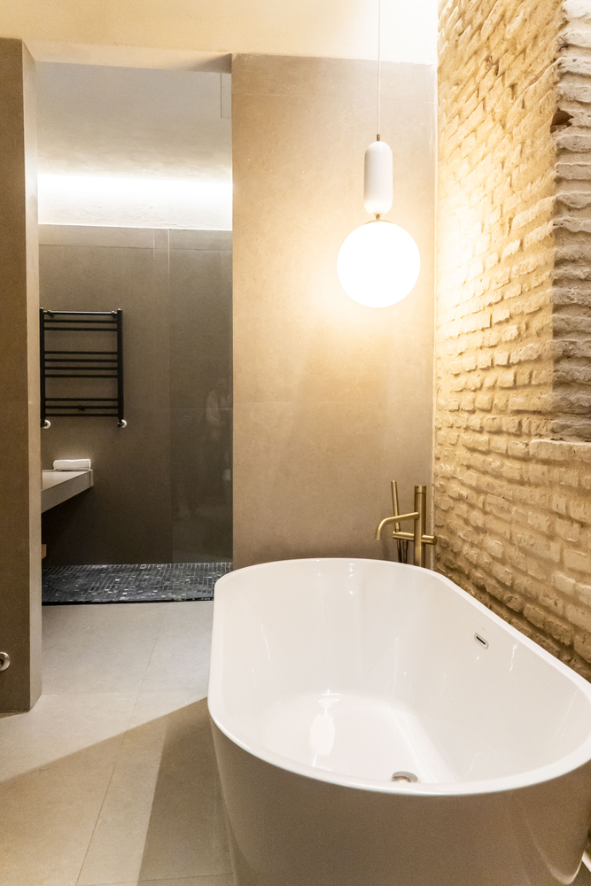 Softly Lit Bathroom with Rustic Brick Texture