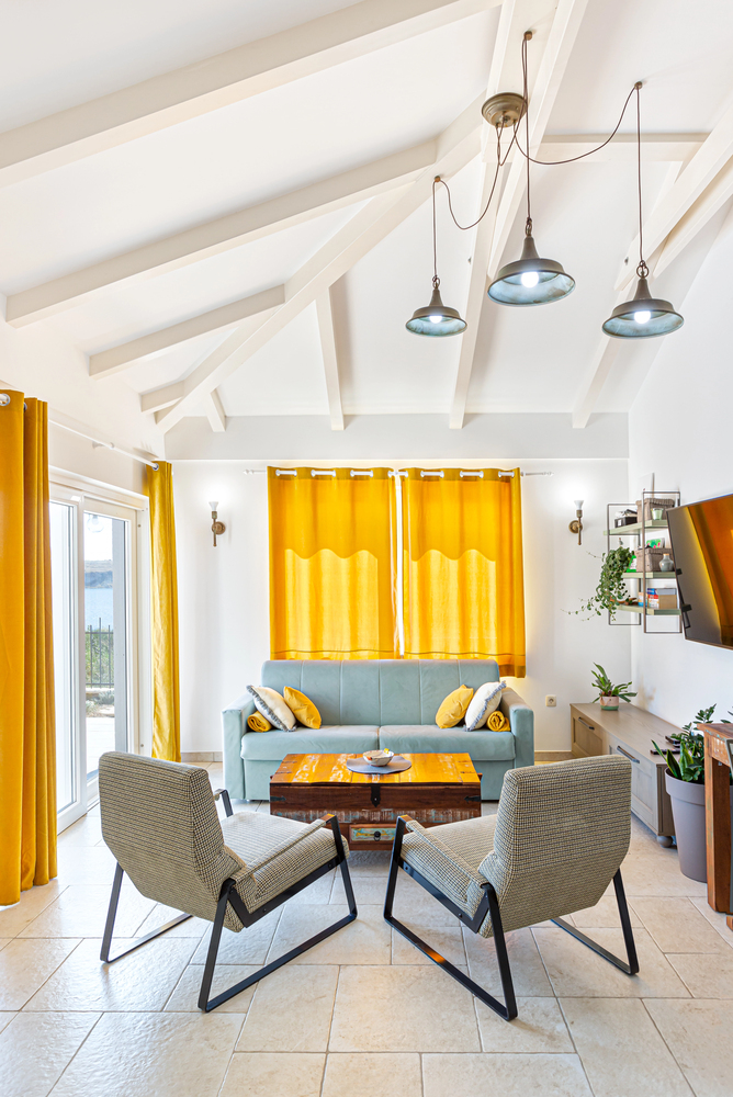 Coastal Living Room with Vaulted Ceiling