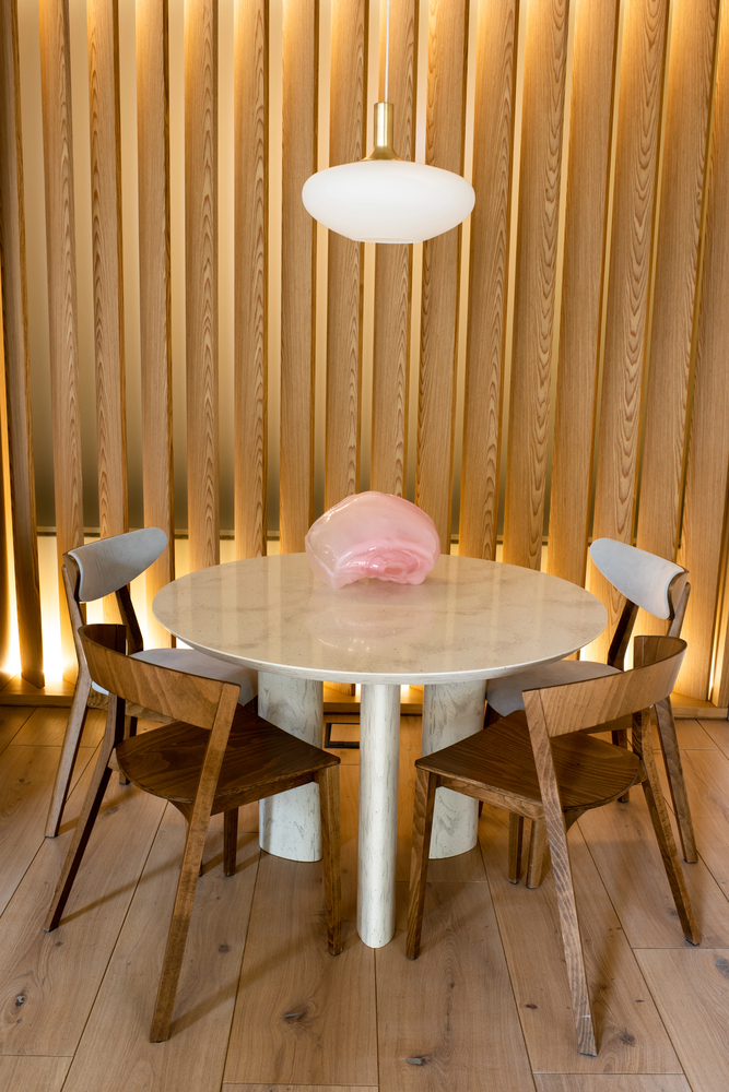 warm wood slat wall in a dining room