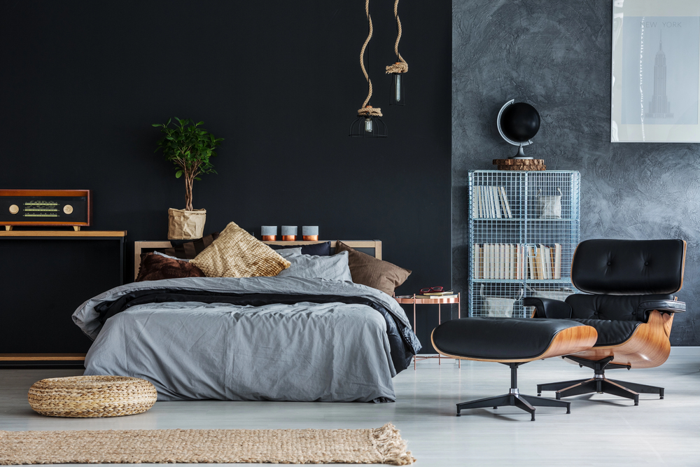 black accent wall in a modern bedroom