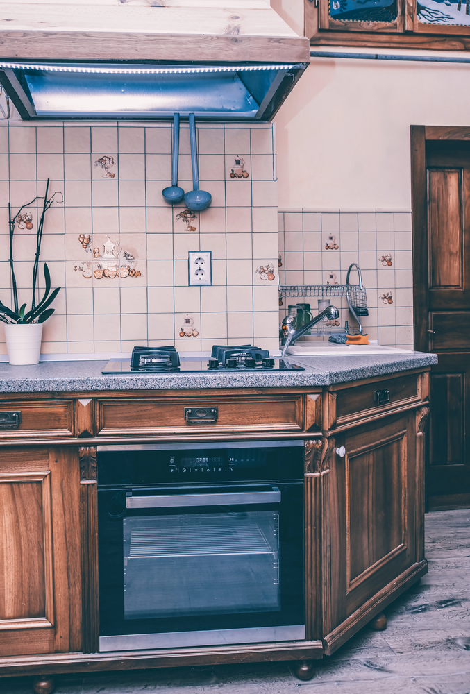 Traditional Rustic Kitchen With Rich Wood Cabinets