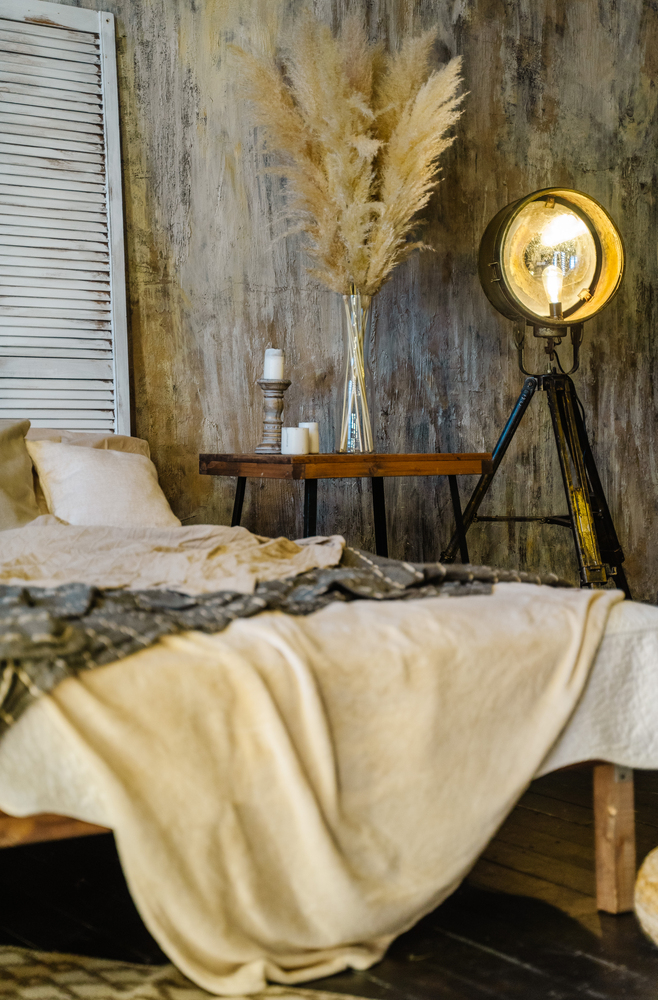 Rustic Textures With Industrial Lighting in a Rustic Bedroom