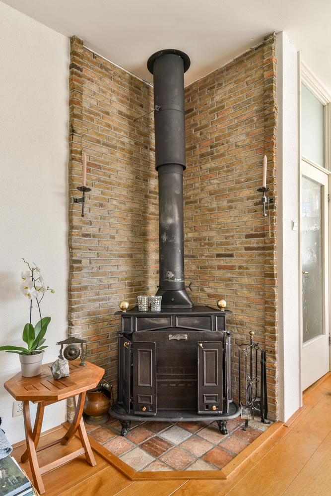 Rustic Home with a vintage stove with exposed brick