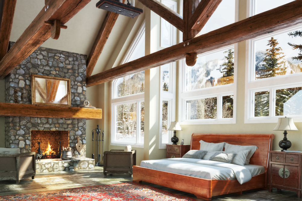 Rustic Bedroom with wooden beams and large windows
