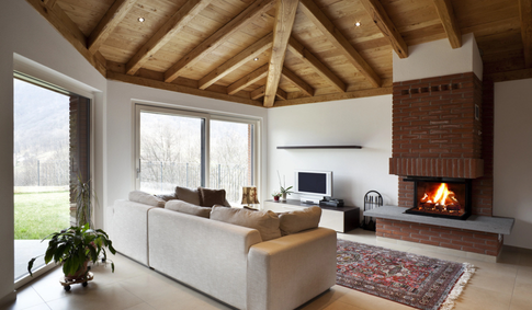 Cozy modern rustic living room with exposed wooden beams